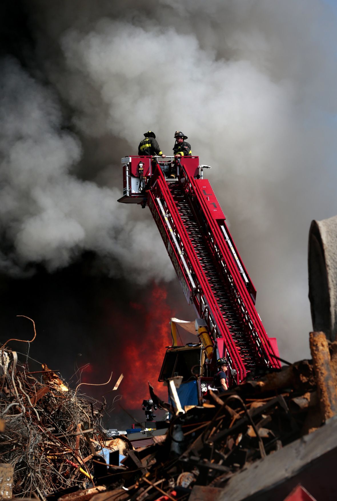 Huge plume of smoke north of downtown reveals scrap metal fire